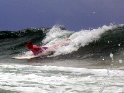 red riding a wave